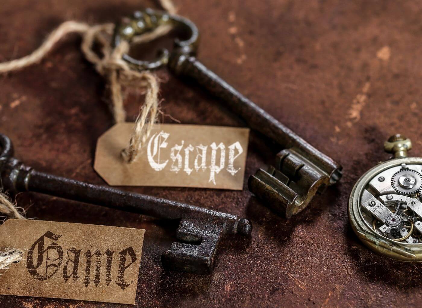 2 Keys are put on a surface to escape the room along with a stop watch