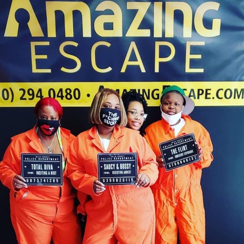 small group dressed as prisoners that escaped the room